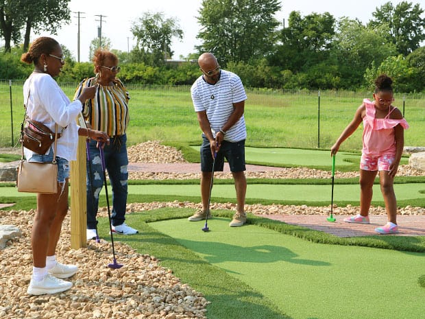 Family enjoying Mini Golf at RYZE Adventure Park