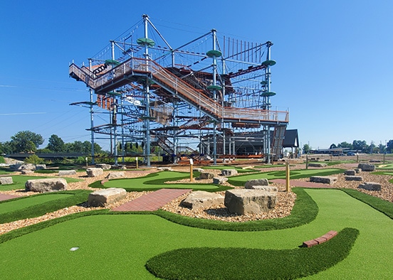 View of RYZE Adventure Park from the ground level mini golf course