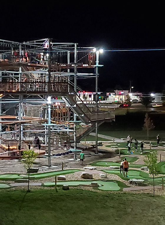 Night Profile of High Ropes Course and Zipline over Minigolf Course in Maryland Heights, MO